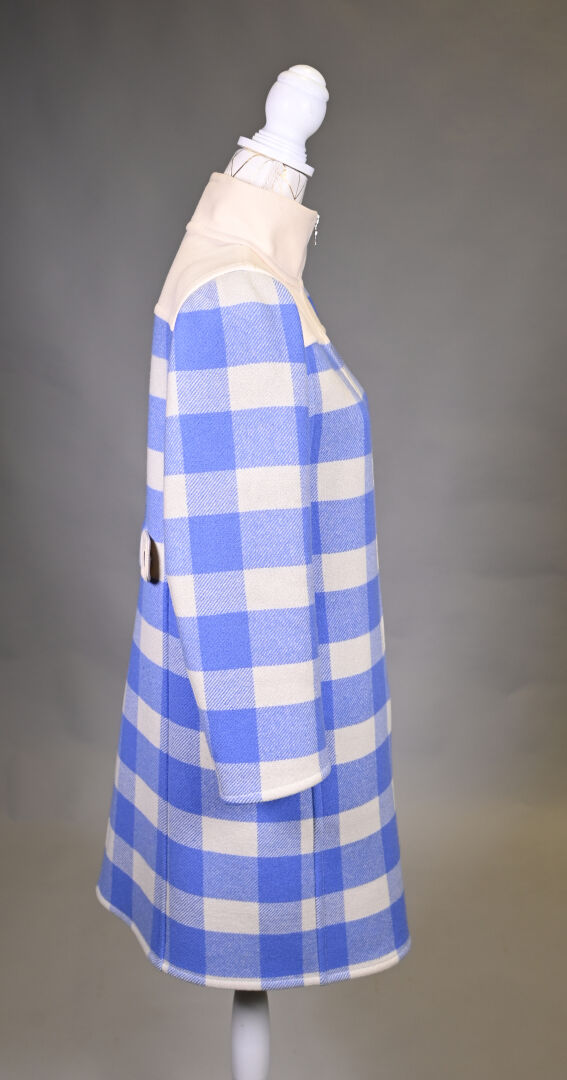 Utiliser la fermeture éclair d'un manteau avec une seule main